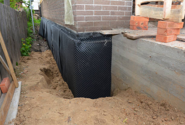 SJ Waterproofing Pros technician performing targeted Sump Pump Installation assessment in Silver Lake, NY